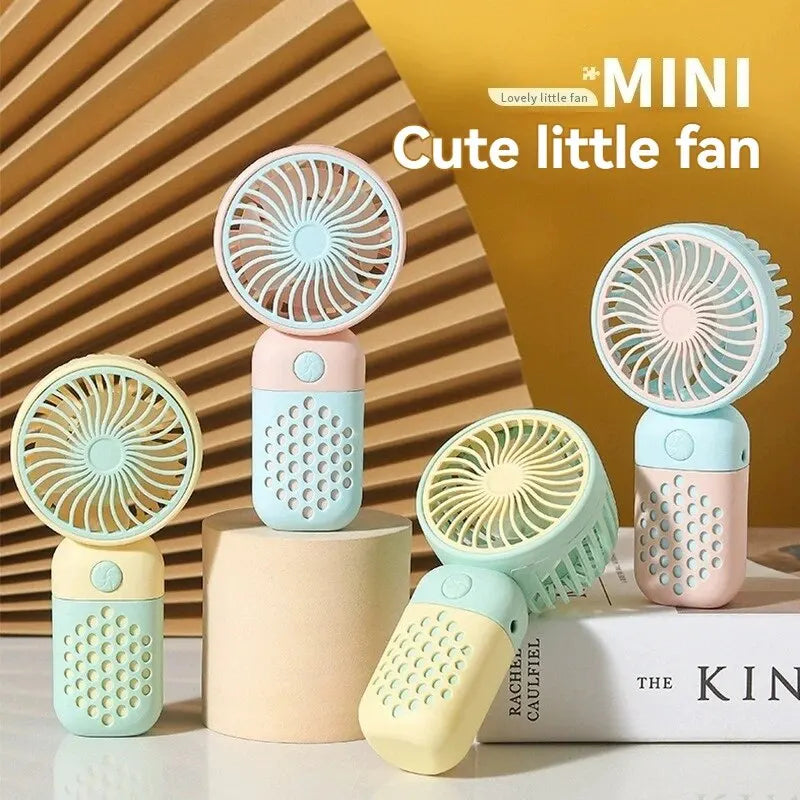 2024 Cartoon Portable Handheld Charging Fan – Stay Cool in Style