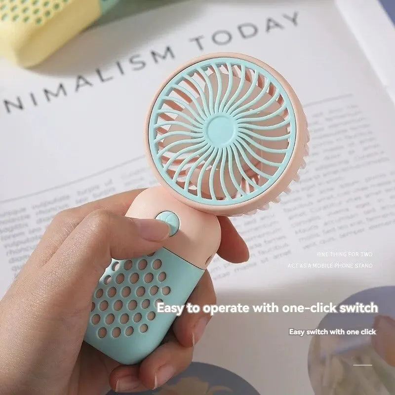 2024 Cartoon Portable Handheld Charging Fan – Stay Cool in Style