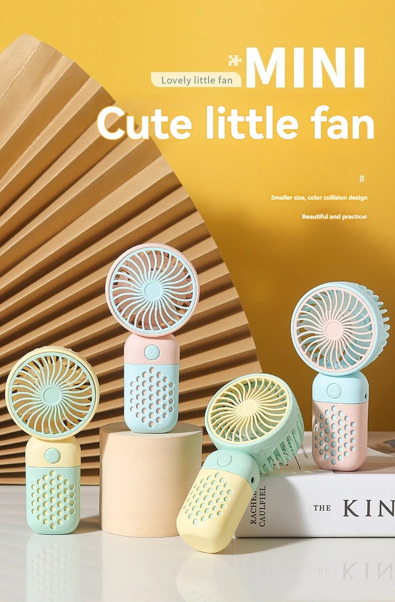 2024 Cartoon Portable Handheld Charging Fan – Stay Cool in Style